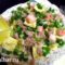 Салат с тунцом,крабовыми палочками,яичными блинчиками и зеленым луком